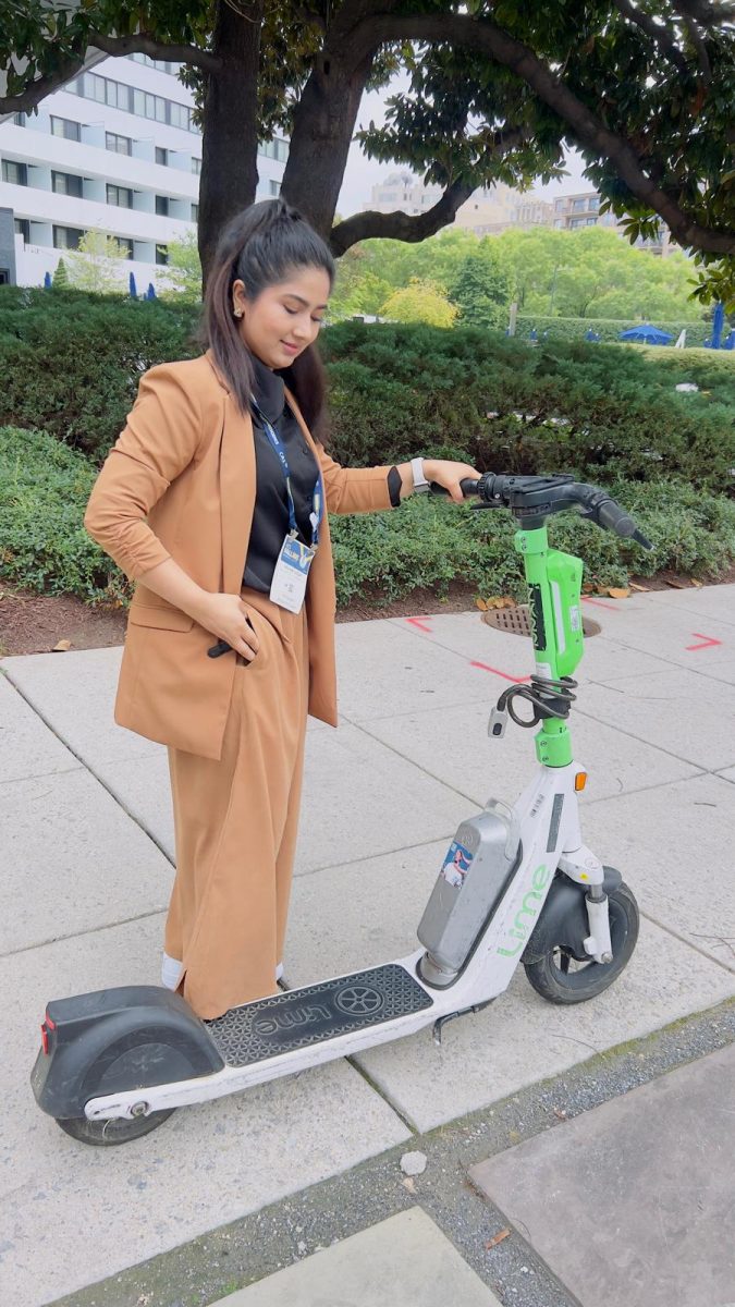 Maham scootering to GSS